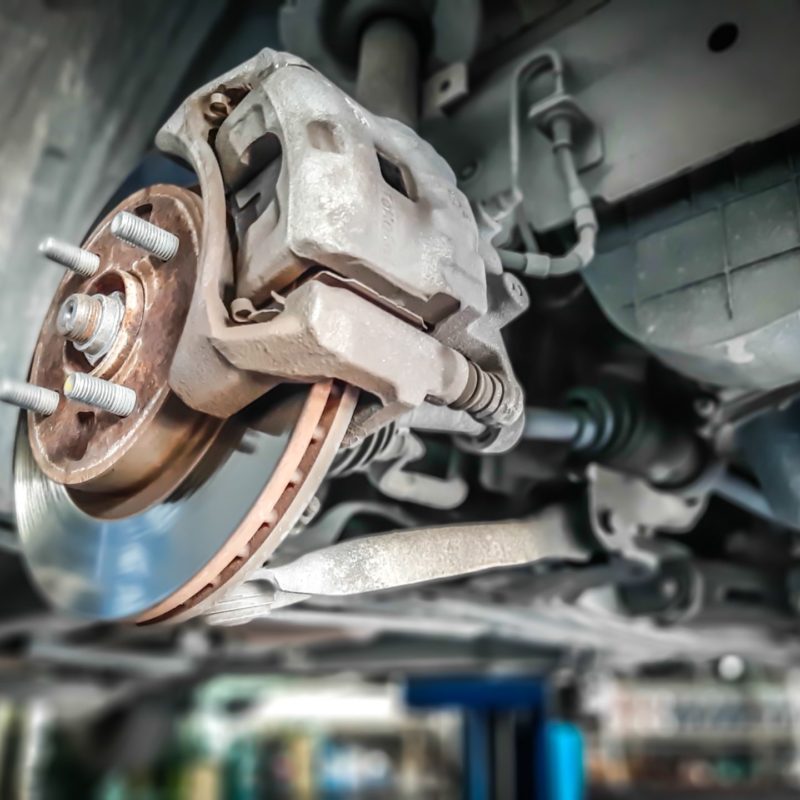 Car take wheel off show drum brake assembly. changing tire. Car take wheel off show drum brake assembly. changing tire.